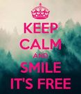 Keep calm and smile it's free on a forest background